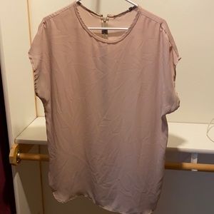 Sleeveless light pink blouse